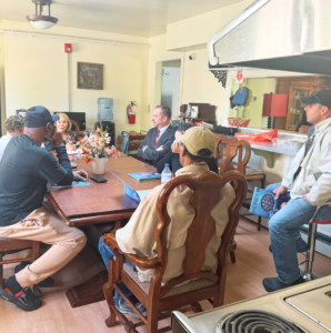 Devon Hainey from Truist Bank giving a financial class to the guests at Evelyn's Place.