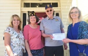 Julie Lowe, Laura Richeson, and representatives from the American Legion