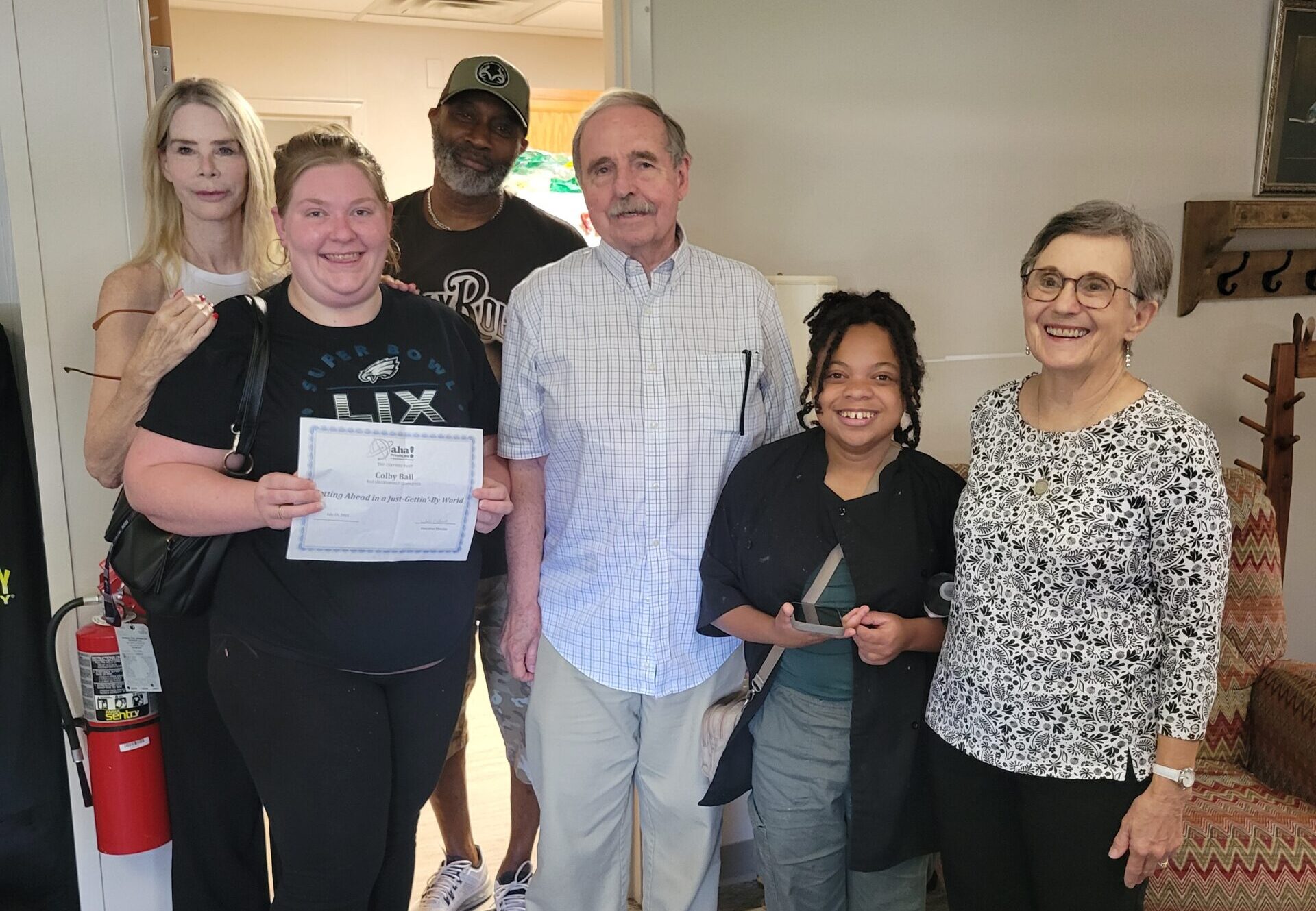 Guests, staff, and board members at Getting Ahead Program graduation
