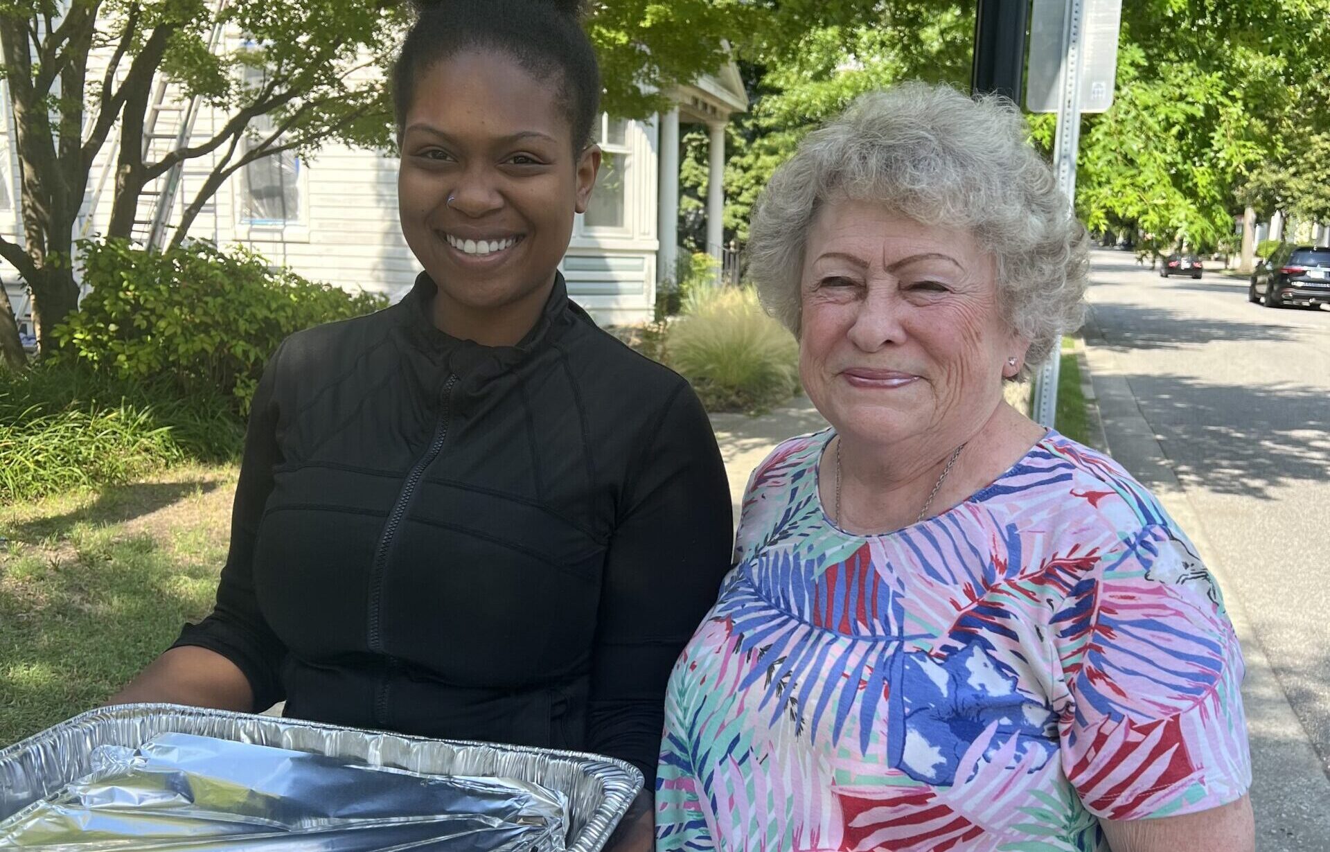 Volunteer dropping off dinner