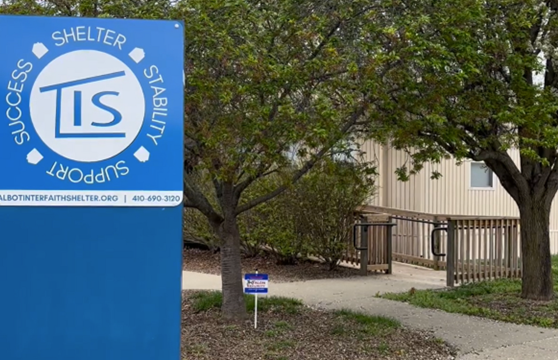 Talbot Interfaith Shelter sign in front of a building