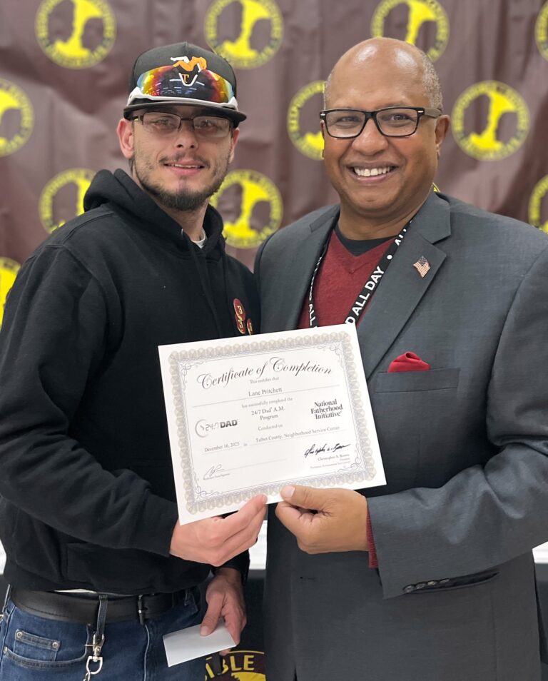 Lane with Corey Pack at RFI Graduation