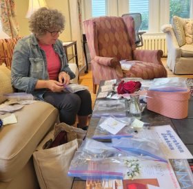 Volunteer sorting donations